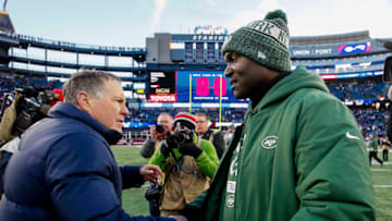 FOXBOROUGH, MASSACHUSETTS - DECEMBER 30: Head coach Todd Bowles of the New York Jets hugs head coach Bill Belichick of the New England Patriots after a game at Gillette Stadium on December 30, 2018 in Foxborough, Massachusetts. (Photo by Jim Rogash/Getty Images)