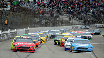 FORT WORTH, TX - APRIL 08: Kurt Busch, driver of the #41 Haas Automation/Monster Energy Ford, and Kevin Harvick, driver of the #4 Busch Light Ford, lead the field on a restart during the Monster Energy NASCAR Cup Series O'Reilly Auto Parts 500 at Texas Motor Speedway on April 8, 2018 in Fort Worth, Texas. (Photo by Robert Laberge/Getty Images)