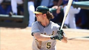 Jun 20, 2013; Arlington, TX, USA; Oakland Athletics catcher John Jaso (5) bats during the game against the Texas Rangers at Rangers Ballpark in Arlington. Texas won 4-3. Mandatory Credit: Kevin Jairaj-USA TODAY Sports