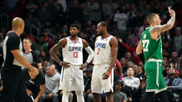 LOS ANGELES, CA - NOVEMBER 20: Paul George #13 Los Angeles Clippers and Kawhi Leonard #2 during overtime against Boston Celtics at Staples Center on November 20, 2019 in Los Angeles, California. It was the first time this season the pair played together after joining the Clippers. NOTE TO USER: User expressly acknowledges and agrees that, by downloading and/or using this Photograph, user is consenting to the terms and conditions of the Getty Images License Agreement. (Photo by Kevork Djansezian/Getty Images)