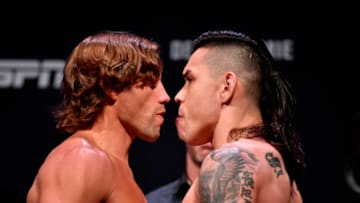 SACRAMENTO, CALIFORNIA - JULY 12: (L-R) Urijah Faber and Ricky Simon face off during the UFC Fight Night weigh-ins at Golden 1 Center on July 12, 2019 in Sacramento, California. (Photo by Jeff Bottari/Zuffa LLC/Zuffa LLC via Getty Images)