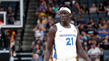 SACRAMENTO, CA - JULY 5: Nuni Omot #21 of the Golden State Warriors looks on during the gam against the Los Angeles Lakers during the 2018 Summer League at the Golden 1 Center on July 5, 2018 in Sacramento, California. NOTE TO USER: User expressly acknowledges and agrees that, by downloading and or using this photograph, User is consenting to the terms and conditions of the Getty Images License Agreement. Mandatory Copyright Notice: Copyright 2018 NBAE (Photo by Rocky Widner/NBAE via Getty Images)