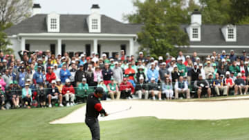 AUGUSTA, GA - APRIL 08: Tiger Woods of the United States plays his third shot on the ninth hole during the final round of the 2018 Masters Tournament at Augusta National Golf Club on April 8, 2018 in Augusta, Georgia. (Photo by Jamie Squire/Getty Images)