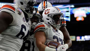 NEW ORLEANS, LA - JANUARY 02: Chandler Cox #27 of the Auburn Tigers reacts after scoring a touchdown against the Oklahoma Sooners during the Allstate Sugar Bowl at the Mercedes-Benz Superdome on January 2, 2017 in New Orleans, Louisiana. (Photo by Sean Gardner/Getty Images)