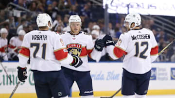 TAMPA, FL - SEPTEMBER 24: Florida Panthers left wing Jamie McGinn (88) celebrates scoring a goal in the 1st period with teammates Florida Panthers defenseman Ian McCoshen (12) and Florida Panthers right wing Radim Vrbata (71) during the NHL preseason game between the Florida Panthers and Tampa Bay Lightning on September 24, 2017, at Amalie Arena in Tampa, FL. (Photo by Mark LoMoglio/Icon Sportswire via Getty Images)