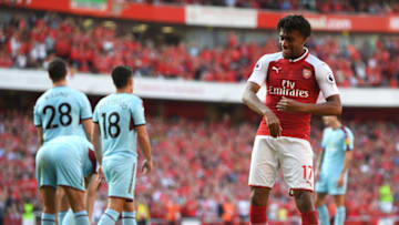 LONDON, ENGLAND - MAY 06: Alex Iwobi of Arsenal celebrates after scoring his sides fourth goal during the Premier League match between Arsenal and Burnley at Emirates Stadium on May 6, 2018 in London, England. (Photo by Mike Hewitt/Getty Images)