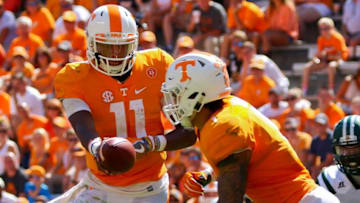 Sep 17, 2016; Knoxville, TN, USA; Tennessee Volunteers quarterback Joshua Dobbs (11) hands the ball off to running back Jalen Hurd (1) during the second half against the Ohio Bobcats at Neyland Stadium. Tennessee won 28 to 19. Mandatory Credit: Randy Sartin-USA TODAY Sports