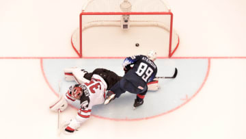United States' Cam Atkinson (L) scores for victory during the group B match US vs Canada of the 2018 IIHF Ice Hockey World Championship at the Jyske Bank Boxen in Herning, Denmark, on May 4, 2018. (Photo by JOE KLAMAR / AFP) (Photo credit should read JOE KLAMAR/AFP/Getty Images)