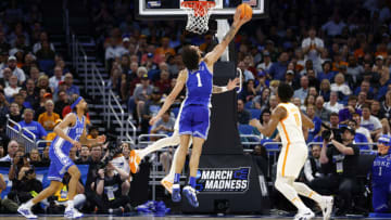 ORLANDO, FLORIDA - MARCH 18: Uros Plavsic #33 of the Tennessee Volunteers blocks a shot by Dereck Lively II #1 of the Duke Blue Devils during the first half of the game in the second round of the NCAA Men's Basketball Tournament at Amway Center on March 18, 2023 in Orlando, Florida. (Photo by Kevin Sabitus/Getty Images)