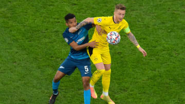 Marco Reus battles for the ball (Photo by OLGA MALTSEVA/AFP via Getty Images)