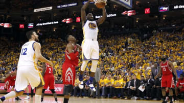 Apr 18, 2016; Oakland, CA, USA; Golden State Warriors forward Draymond Green (23) dunks the ball against the Houston Rockets in the fourth quarter in game two of the first round of the NBA Playoffs at Oracle Arena. The Warriors defeated the Rockets 115-106. Mandatory Credit: Cary Edmondson-USA TODAY Sports