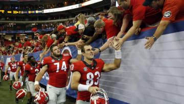 Sep 3, 2016; Atlanta, GA, USA; Georgia Bulldogs tight end Jeb Blazevich (83) high fives fans after the 2016 Chick-Fil-A Kickoff game against the North Carolina Tar Heels at Georgia Dome. Georgia won 33-24. Mandatory Credit: Jason Getz-USA TODAY Sports