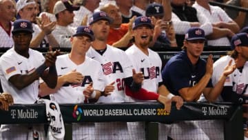 USA's dugout celebrates a hit against Great Britain during the World Baseball Classic at Chase Field in Phoenix on March 11, 2023.Baseball World Baseball Classic Opening Day