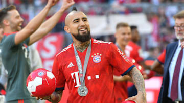 MUNICH, GERMANY - MAY 12: Arturo V,idal of Muenchen laughs after the Bundesliga match between FC Bayern Muenchen and VfB Stuttgart at Allianz Arena on May 12, 2018 in Munich, Germany. (Photo by TF-Images/Getty Images)