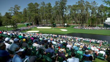 AUGUSTA, GEORGIA - APRIL 07: (EDITOR'S NOTE: This image was created using a polarizing filter). Fans look on to 16th green the during the first round of the Masters at Augusta National Golf Club on April 07, 2022 in Augusta, Georgia. (Photo by Andrew Redington/Getty Images)