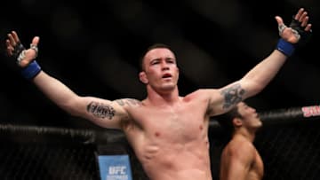 SINGAPORE - JUNE 17: Colby Covington of United States (front) reacts after his fight with Dong Hyun Kim of South Korea (back) in the Welterweight Bout during UFC Singapore Fight Night at Singapore Indoor Stadium on June 17, 2017 in Singapore. (Photo by Suhaimi Abdullah/Getty Images)