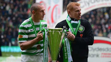 GLASGOW, SCOTLAND - MAY 11: Celtic Manager Neil Lennon (R) and Scott Brown pose with the Scottish Premier League trophy following the Clydesdale Bank Scottish Premier League match between Celtic and St Johnstone at Celtic Park Stadium on May 11, 2013 in Glasgow, Scotland. (Photo by Jeff J Mitchell/Getty Images)