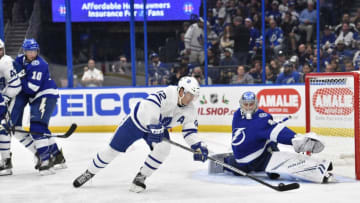 TAMPA, FL - DECEMBER 13: Toronto Maple Leafs center Patrick Marleau (12) has his backhand shot saved by Tampa Bay Lightning goalie Andrei Vasilevsky (88) during the third period of an NHL game between the Toronto Maple Leafs and the Tampa Bay Lightning on December 13, 2018, at Amalie Arena in Tampa, FL. (Photo by Roy K. Miller/Icon Sportswire via Getty Images)