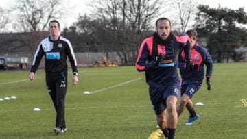 NEWCASTLE UPON TYNE, ENGLAND - JANUARY 28: New Signing Andros Townsend (R) runs on the pitch during the Newcastle United Training session at The Newcastle United Training Centre on January 28, 2016, in Newcastle upon Tyne, England. (Photo by Serena Taylor/Newcastle United via Getty Images)