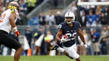 Oct 8, 2016; University Park, PA, USA; Penn State Nittany Lions cornerback John Reid (29) runs with the ball during the first quarter against the Maryland Terrapins at Beaver Stadium. Mandatory Credit: Matthew O