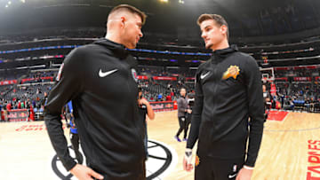 LOS ANGELES, CA - FEBRUARY 13: Ivica Zubac #40 of the LA Clippers and Dragan Bender #35 of the Phoenix Suns speak before the game on February 13, 2019 at STAPLES Center in Los Angeles, California. NOTE TO USER: User expressly acknowledges and agrees that, by downloading and/or using this Photograph, user is consenting to the terms and conditions of the Getty Images License Agreement. Mandatory Copyright Notice: Copyright 2019 NBAE (Photo by Andrew D. Bernstein/NBAE via Getty Images)