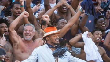 Auburn's mens basketball coach Bruce Pearl greets Auburn football alum NFL quarterback Cam Newton at Jordan-Hare Stadium in Auburn, Ala., on Saturday, Oct. 9, 2021. Georgia Bulldogs lead the Auburn Tigers 17-3 at halftime.
