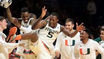 Feb 17, 2016; Coral Gables, FL, USA; Miami Hurricanes guard Sheldon McClellan (left) celebrates with Miami Hurricanes guard Davon Reed (right) during the second half against the Virginia Tech Hokies at BankUnited Center. Mandatory Credit: Steve Mitchell-USA TODAY Sports