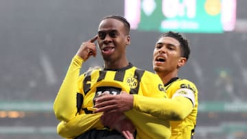Jamie Bynoe-Gittens celebrates with Jude Bellingham after giving Borussia Dortmund the lead (Photo by Martin Rose/Getty Images)