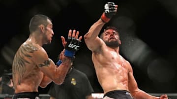 Jul 15, 2015; San Diego, CA, USA; Josh Thomson (red) fights Tony Ferguson (blue) during UFC Fight Night at Valley View Casino Center. Mandatory Credit: Jake Roth-USA TODAY Sports