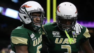NEW ORLEANS, LOUISIANA - DECEMBER 21: Austin Watkins #6 of the UAB Blazers reacts after scoring a touchdown against the Appalachian State Mountaineers during the R+L Carriers New Orleans Bowl at Mercedes-Benz Superdome on December 21, 2019 in New Orleans, Louisiana. (Photo by Chris Graythen/Getty Images)
