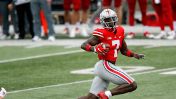Oct 24, 2020; Columbus, Ohio, USA; Ohio State Buckeyes cornerback Sevyn Banks (7) picks up the fumble and returns it for the touchdown during the third quarter against the Nebraska Cornhuskers at Ohio Stadium. Mandatory Credit: Joseph Maiorana-USA TODAY Sports
