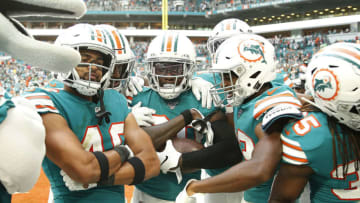 MIAMI, FLORIDA - DECEMBER 01: Chris Lammons #30 of the Miami Dolphins celebrates with teammates after the game against the Philadelphia Eagles at Hard Rock Stadium on December 01, 2019 in Miami, Florida. (Photo by Michael Reaves/Getty Images)