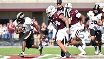 Nov 18, 2023; Starkville, Mississippi, USA; Southern Miss Golden Eagles running back Frank Gore Jr. (3) runs the ball against the Mississippi State Bulldogs during the second quarter at Davis Wade Stadium at Scott Field. Mandatory Credit: Matt Bush-USA TODAY Sports