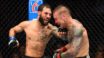 AUSTIN, TX - FEBRUARY 18: Brandon Davis (L) punches Steven Peterson in their featherweight bout during the UFC Fight Night event at Frank Erwin Center on February 18, 2018 in Austin, Texas. (Photo by Josh Hedges/Zuffa LLC/Zuffa LLC via Getty Images)