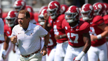 TUSCALOOSA, ALABAMA - SEPTEMBER 23: Head coach Nick Saban of the Alabama Crimson Tide runs the team out of the tunnel for warm ups prior to facing the Mississippi Rebels at Bryant-Denny Stadium on September 23, 2023 in Tuscaloosa, Alabama. (Photo by Kevin C. Cox/Getty Images)