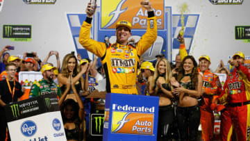 RICHMOND, VA - SEPTEMBER 22: Kyle Busch, driver of the #18 M&M's Toyota, celebrates in Victory Lane after winning the Monster Energy NASCAR Cup Series Federated Auto Parts 400 at Richmond Raceway on September 22, 2018 in Richmond, Virginia. (Photo by Brian Lawdermilk/Getty Images)