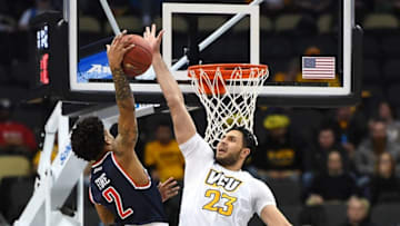 PITTSBURGH, PA - MARCH 11: Ahmed Hamdy-Mohamed #23 of the Virginia Commonwealth Rams blocks a shot by Khwan Fore #2 of the Richmond Spiders during the semifinals of the Atlantic 10 Basketball Tournament at PPG PAINTS Arena on March 11, 2017 in Pittsburgh, Pennsylvania. (Photo by Joe Sargent/Getty Images)