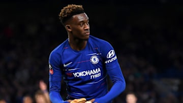 LONDON, ENGLAND - JANUARY 05: Callum Hudson-Odoi of Chelsea picks up a burger and takes it to the side of the pitch during the FA Cup Third Round match between Chelsea and Nottingham Forest at Stamford Bridge on January 5, 2019 in London, United Kingdom. (Photo by Darren Walsh/Chelsea FC via Getty Images)