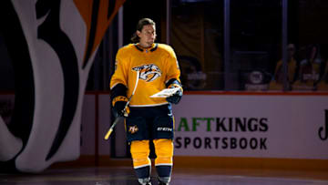 NASHVILLE, TN - JANUARY 14: Erik Haula #56 of the Nashville Predators is announced before the game against the Columbus Blue Jackets at Bridgestone Arena on January 14, 2021 in Nashville, Tennessee. Players honored members of law enforcement that participated in the Nashville Christmas bombing investigation. (Photo by Brett Carlsen/Getty Images)