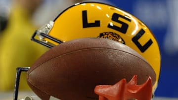 LSU kicker Chris Jackson's tee, helmet and a football are ready for play against the University of Miami during the 2005 Chick-fil-A Peach Bowl at the Georgia Dome in Atlanta, Georgia on December 30, 2005. LSU defeated Miami 40-3. (Photo by A. Messerschmidt/Getty Images)