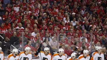 Apr 14, 2016; Washington, DC, USA; Philadelphia Flyers players watch from the bench against the Washington Capitals in the second period in game one of the first round of the 2016 Stanley Cup Playoffs at Verizon Center. The Capitals won 2-0, and lead the series 1-0. Mandatory Credit: Geoff Burke-USA TODAY Sports