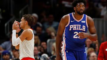 ATLANTA, GEORGIA - OCTOBER 28: Trae Young #11 of the Atlanta Hawks and Joel Embiid #21 of the Philadelphia 76ers react in the second half at State Farm Arena on October 28, 2019 in Atlanta, Georgia. NOTE TO USER: User expressly acknowledges and agrees that, by downloading and/or using this photograph, user is consenting to the terms and conditions of the Getty Images License Agreement. (Photo by Kevin C. Cox/Getty Images)