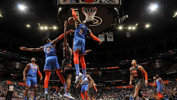 JANUARY 22: Shai Gilgeous-Alexander #2 and Nerlens Noel #9 of the OKC Thunder play defense against the Orlando Magic (Photo by Fernando Medina/NBAE via Getty Images)