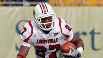 October 30, 2010; Pittsburgh, PA, USA; Louisville Cardinals wide receiver Doug Beaumont (27) carries the ball in the open field against the Pittsburgh Panthers during the first quarter at Heinz Field. Pittsburgh won 20-3. Mandatory Credit: Charles LeClaire-USPRESSWIRE