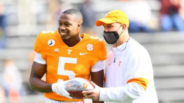Tennessee wide receiver Josh Palmer (5) poses for a photo with Tennessee Head Coach Jeremy Pruitt before a game between Tennessee and Texas A&M in Neyland Stadium in Knoxville, Saturday, Dec. 19, 2020.