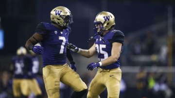 Oct 17, 2015; Seattle, WA, USA; Washington Huskies linebacker Ben Burr-Kirven (25) celebrates his sack against the Oregon Ducks with linebacker Keishawn Bierria (7) during the second quarter at Husky Stadium. Mandatory Credit: Jennifer Buchanan-USA TODAY Sports