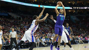 Mar 29, 2016; Philadelphia, PA, USA; Charlotte Hornets guard Nicolas Batum (5) shoots the ball over Philadelphia 76ers guard Hollis Thompson (31) during the first quarter at Wells Fargo Center. Mandatory Credit: Bill Streicher-USA TODAY Sports