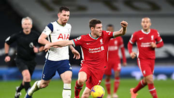 LONDON, ENGLAND - JANUARY 28: James Milner of Liverpool is challenged by Pierre-Emile Hojbjerg of Tottenham Hotspur during the Premier League match between Tottenham Hotspur and Liverpool at Tottenham Hotspur Stadium on January 28, 2021 in London, England. Sporting stadiums around the UK remain under strict restrictions due to the Coronavirus Pandemic as Government social distancing laws prohibit fans inside venues resulting in games being played behind closed doors. (Photo by Shaun Botterill/Getty Images)