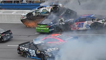 May 1, 2016; Talladega, AL, USA; NASCAR Sprint Cup Series driver Kevin Harvick (4) and Ricky Stenhouse Jr. (17) and AJ Allmendinger (47) and Martin Truex Jr. (78) and Cole Whitt (98) wreck on the last lap during the GEICO 500 at Talladega Superspeedway. Mandatory Credit: Jasen Vinlove-USA TODAY Sports