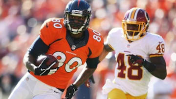 Oct 27, 2013; Denver, CO, USA; Denver Broncos wide receiver Julius Thomas (80) runs with the ball after making a catch during the first half against the Washington Redskins at Sports Authority Field at Mile High. Mandatory Credit: Chris Humphreys-USA TODAY Sports